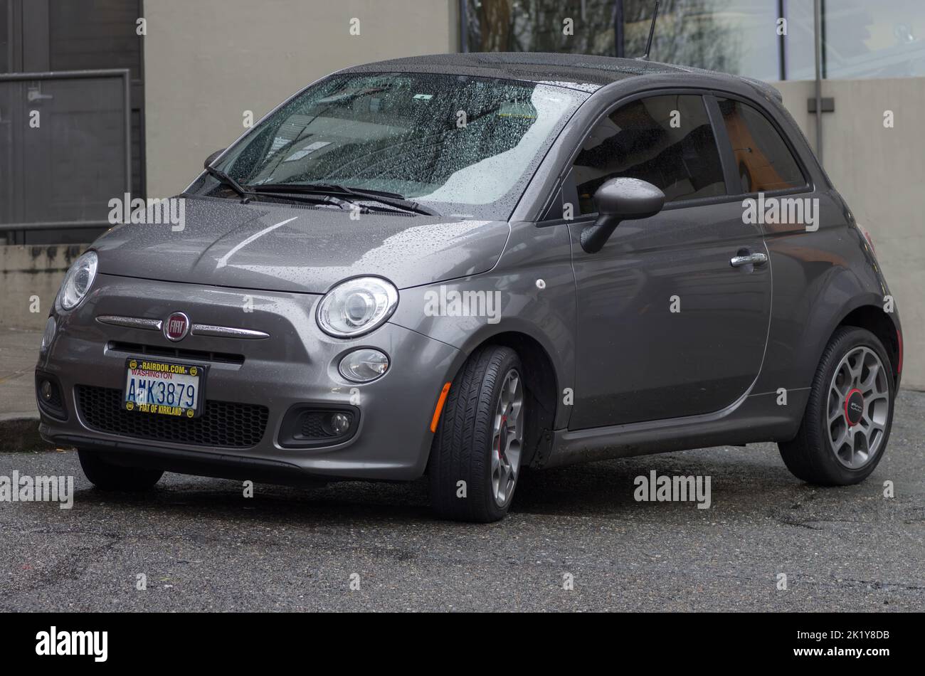 Seattle, Whasignton, Uninited States - January 17th, 2016: modern Fiat 500 shown parked on a rainy day. Stock Photo