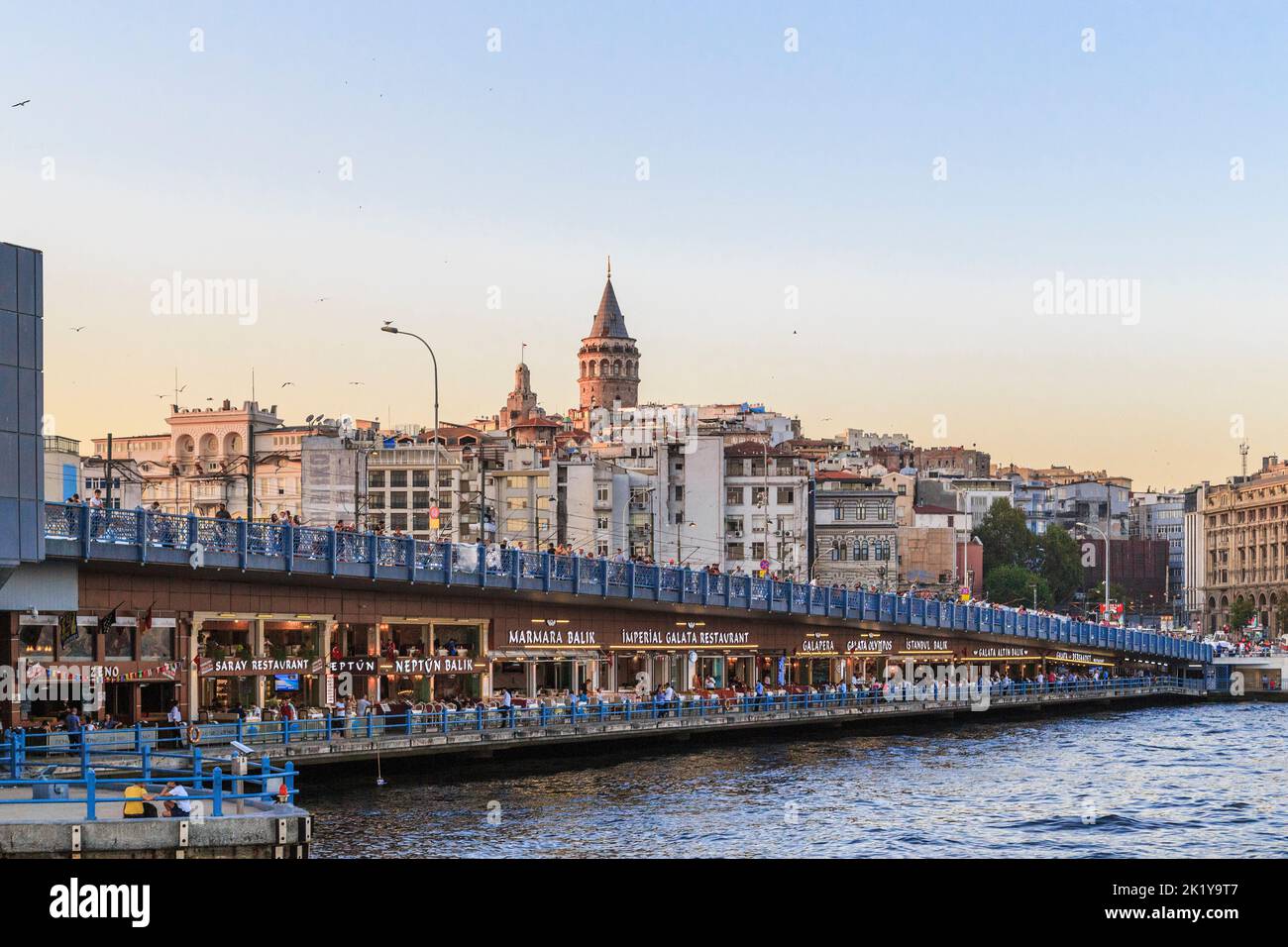 ISTANBUL, TURKEY - SEPTEMBER 12, 2017: This is a view of the Galata Bridge and the Galata Tower at sunset. Stock Photo