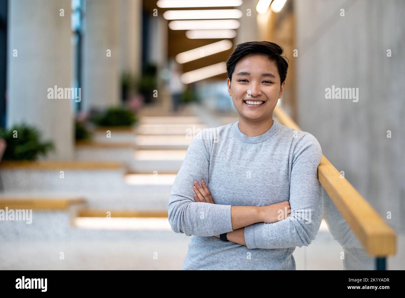 Portrait of a smiling young man in the office Stock Photo