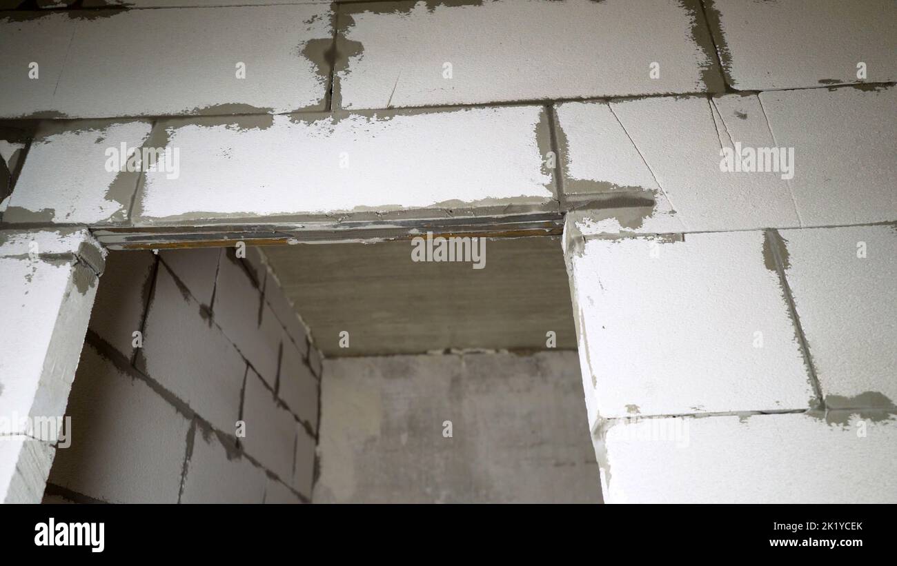 Wall made foam blocks, cinder blocks, cement mortar. new apartment