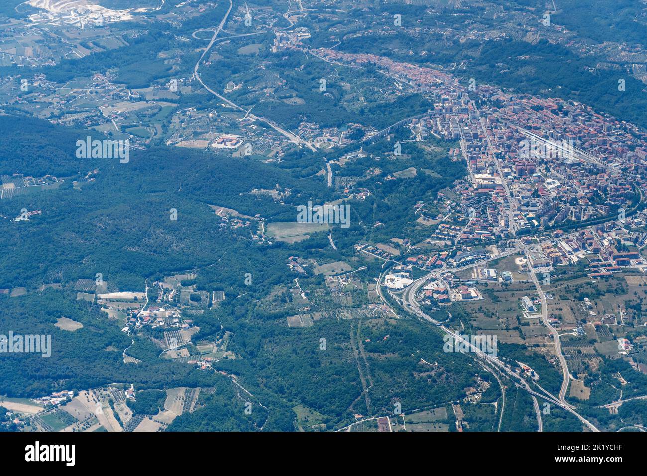 aerial shot, from a small plane, of Isernia town, shot in bright summer light from north, Isernia, Molise, Abruzzo,  Italy Stock Photo
