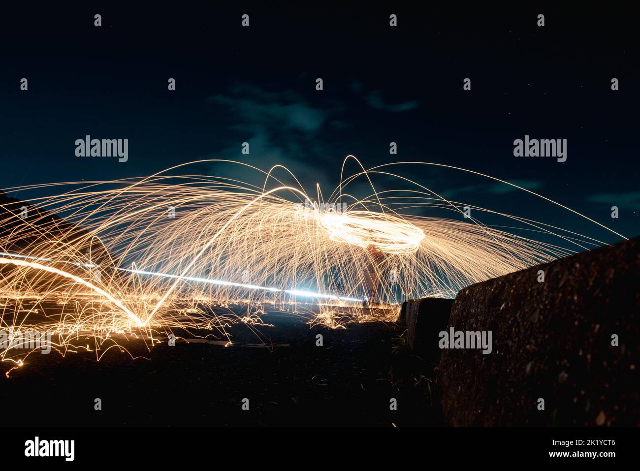 Steel wool photography light painting at night Stock Photo Alamy