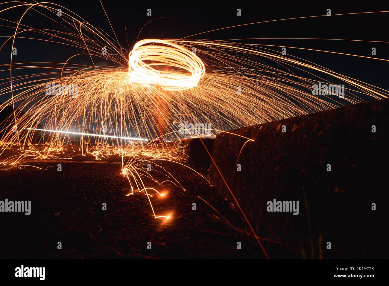 Steel wool photography light painting at night Stock Photo Alamy