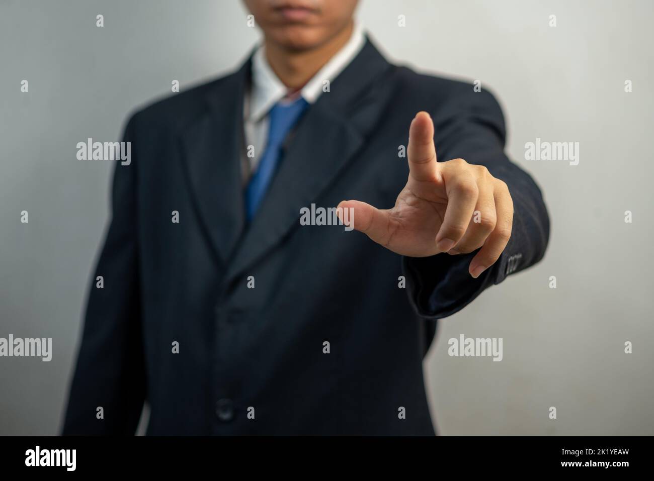 Businessman pressing button on virtual screen.copy Space for text. Stock Photo