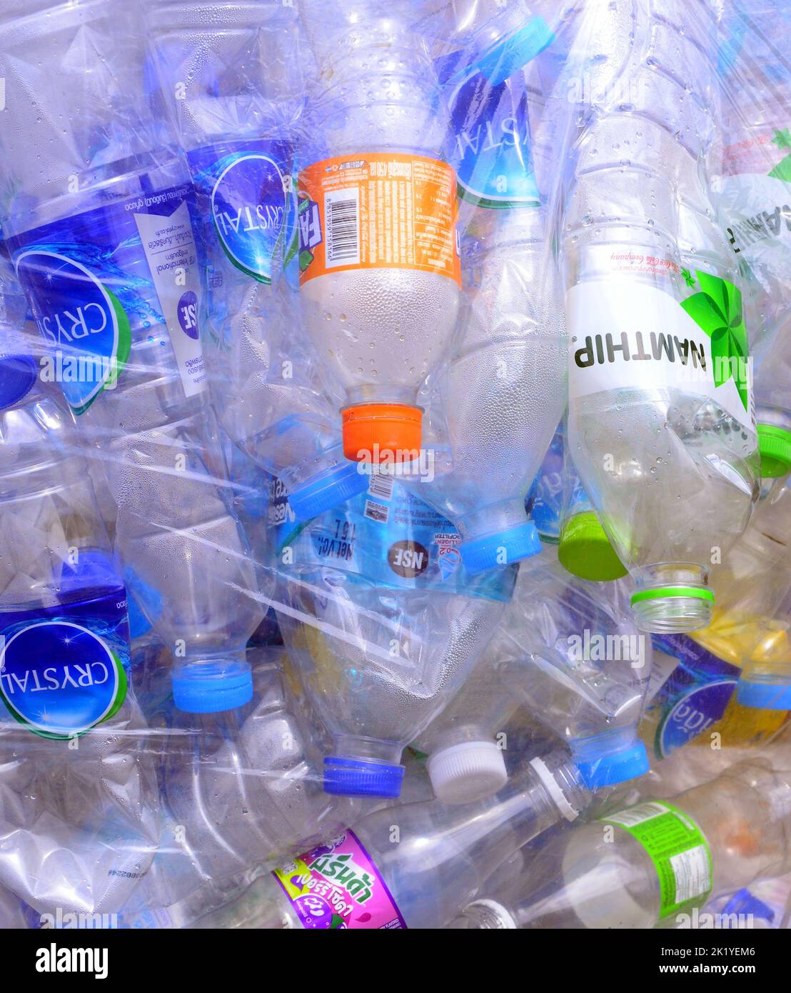 Plastic bags of used aluminium drinks or beverage cans wait to be