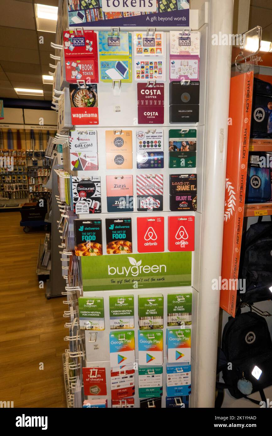 A variety of gift cards on revolving shelf in a shop in Norwich Norfolk England Uk Stock Photo