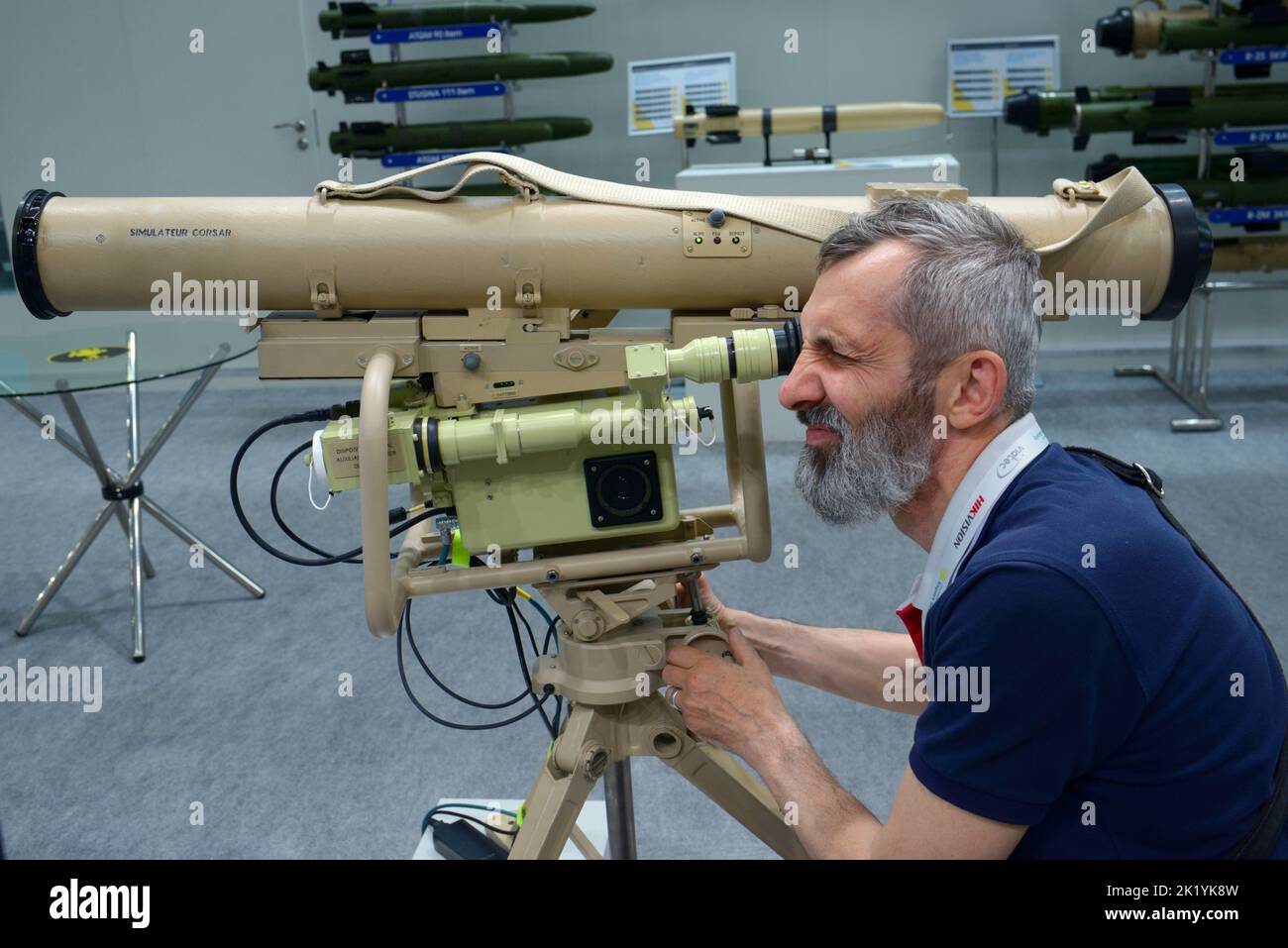 Man looking into the eyepiece of the simulator of the anti tank missile