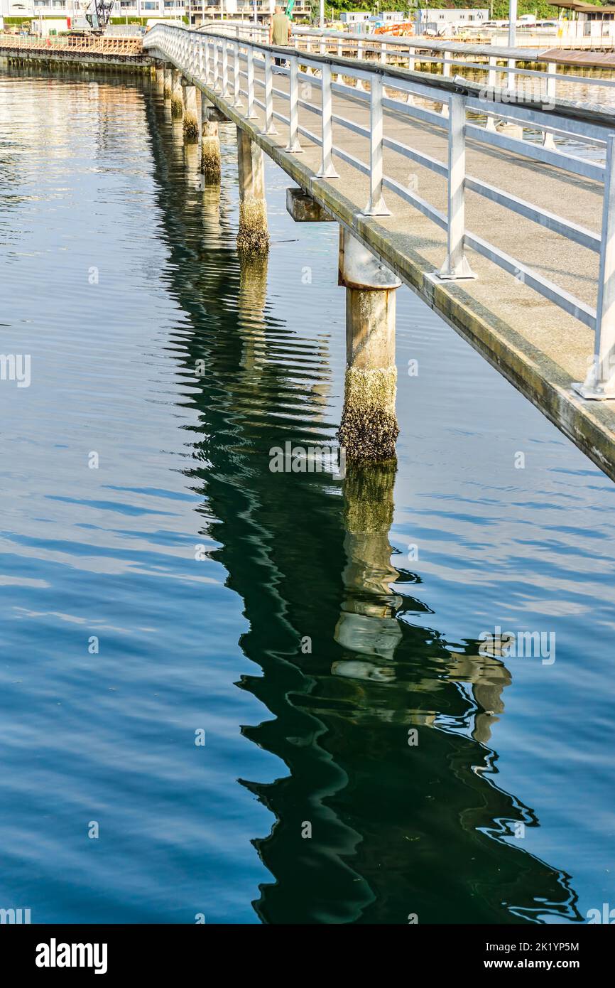Reflection beneath th pier at the Des Moinese marina in Washington State. Stock Photo