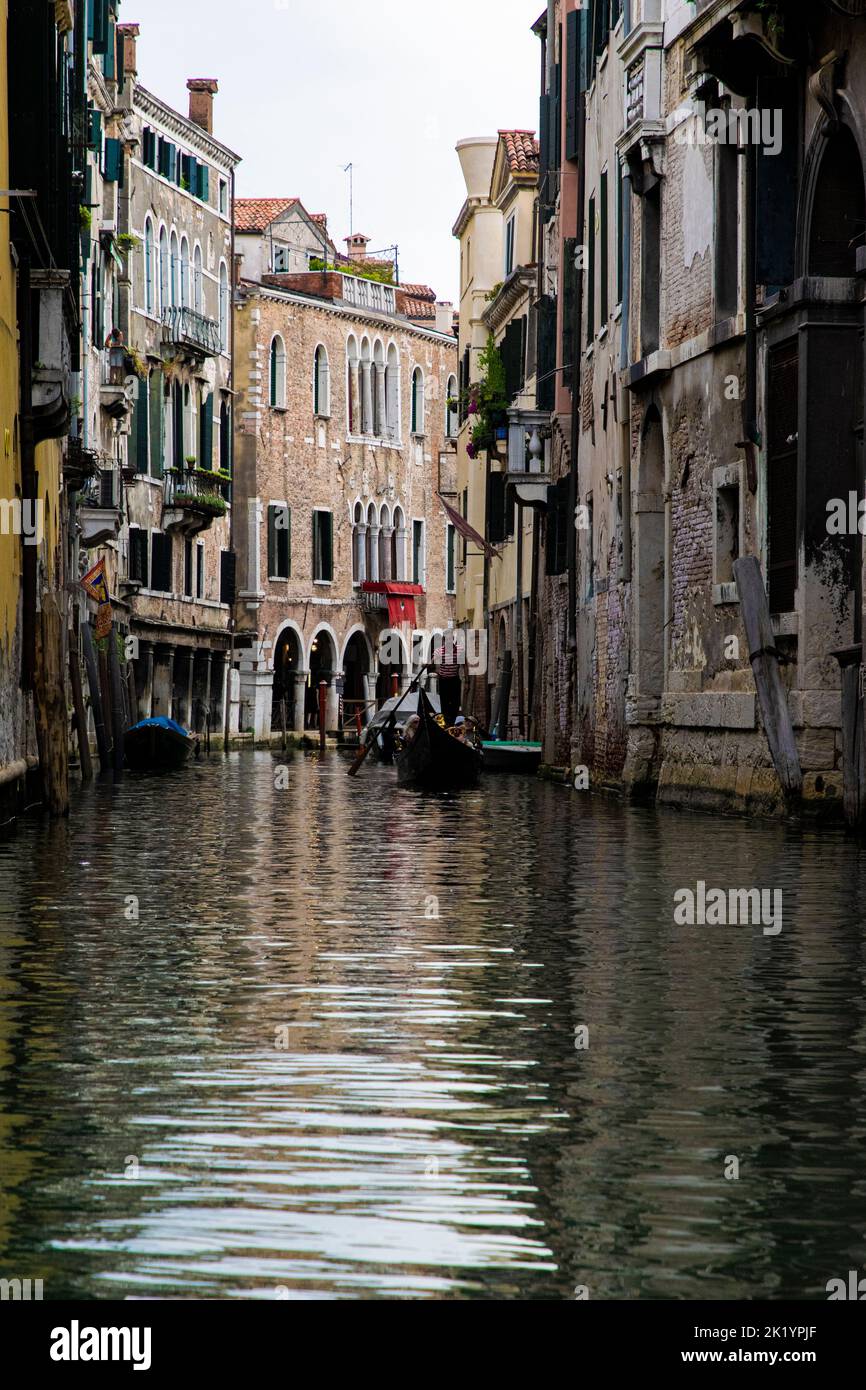 A gondola trip along the Venice water channels Stock Photo