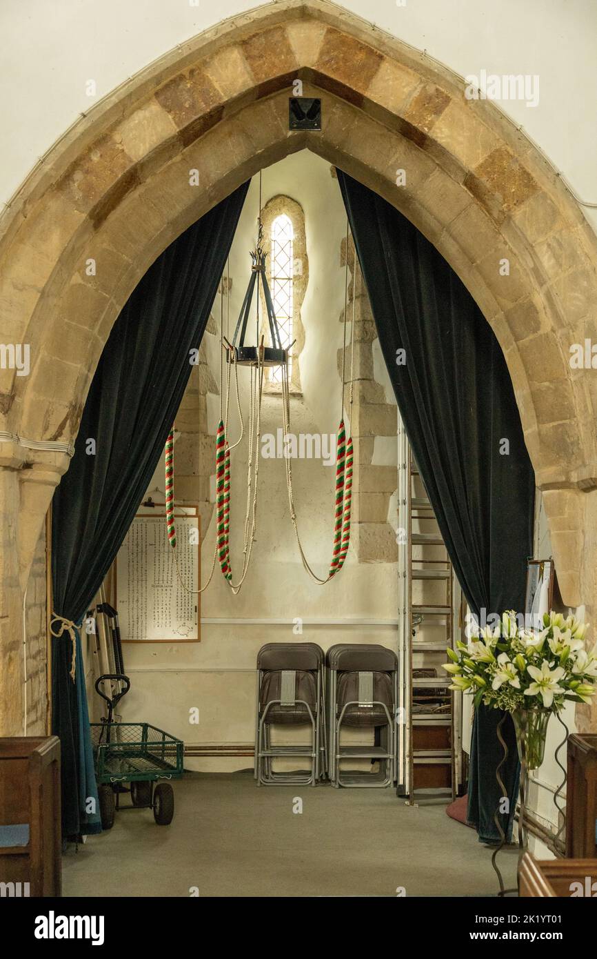 Bell ringing ropes in a church Stock Photo