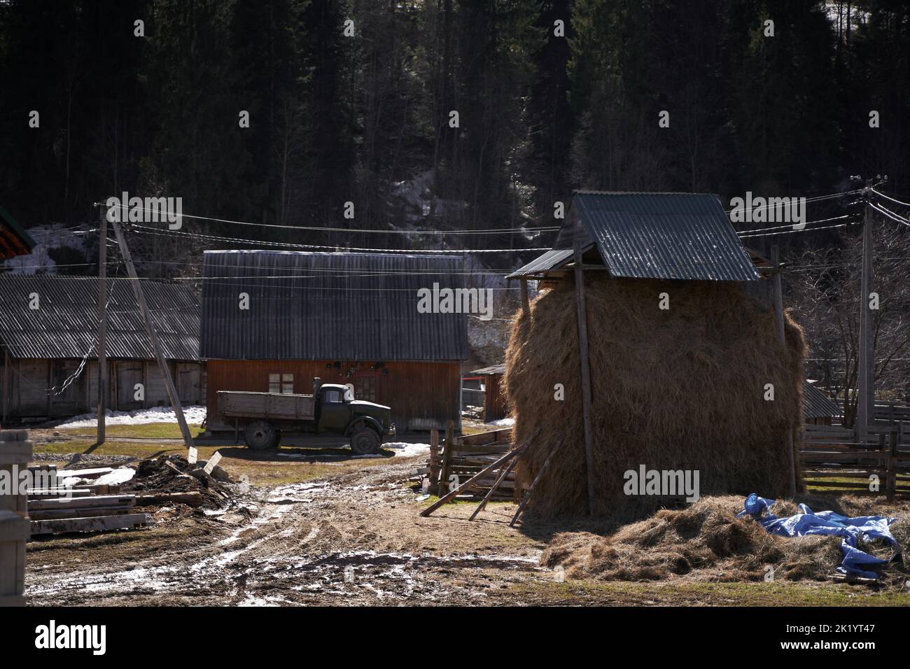 Village landscape mud yard and hay stack Stock Photo Alamy