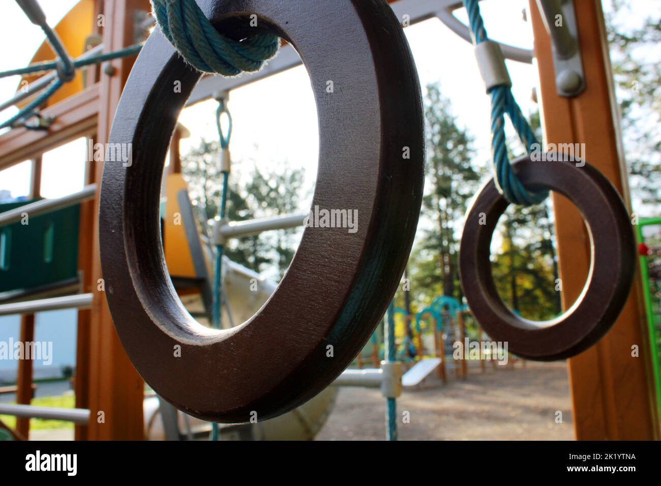 Gymnastic rings closeup on a children's outdoor playground. Healthy