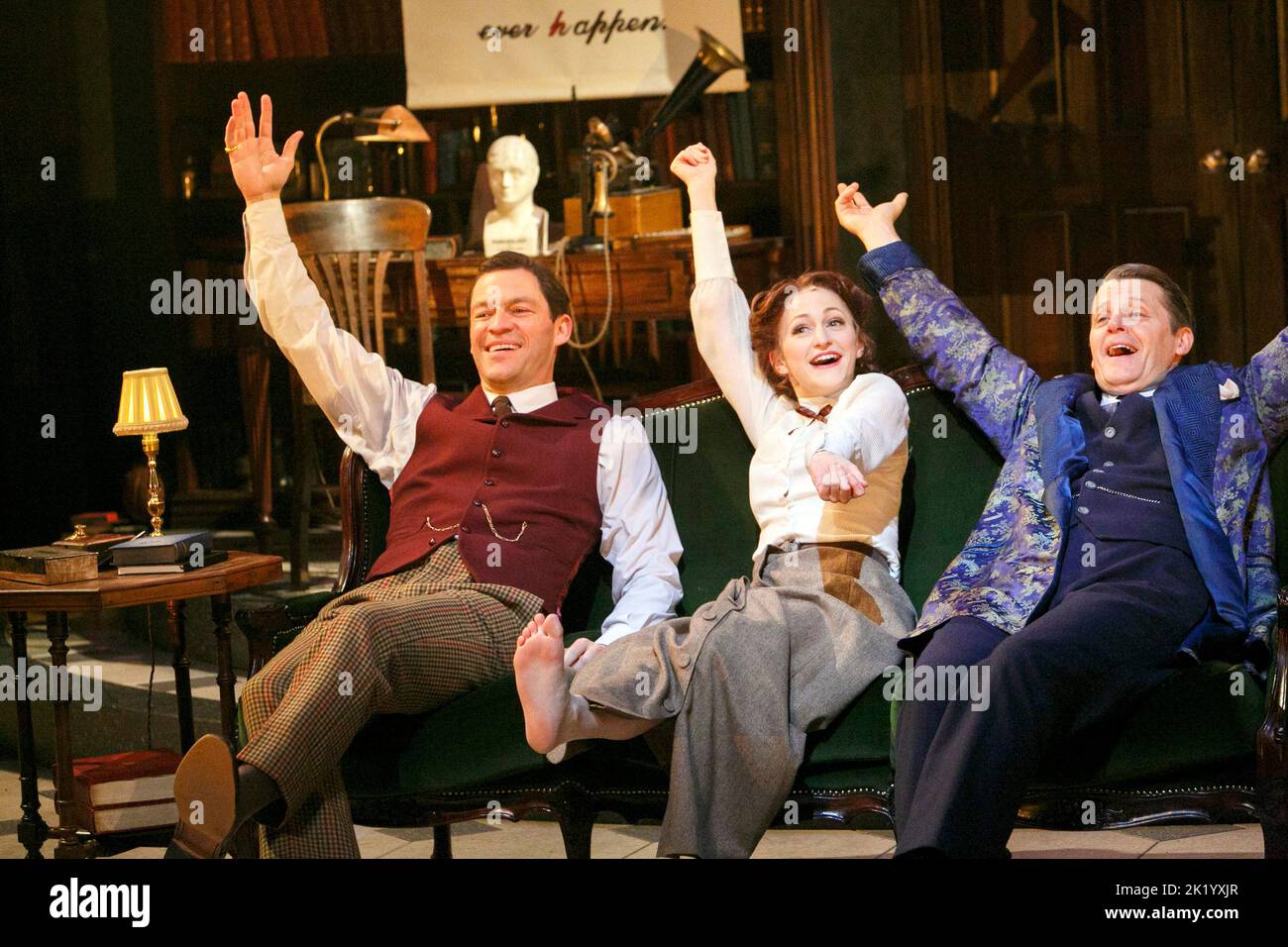 'The Rain in Spain' - l-r: Dominic West (Professor Higgins), Carly Bawden (Eliza Doolittle), Anthony Calf (Colonel Pickering) in MY FAIR LADY at the Crucible Theatre, Sheffield, England  18/12/2012  book & lyrics: Alan Jay Lerner  music: Frederick Loewe  based on G B Shaw's 'Pygmalion'  design: Paul Wills  lighting: Tim Mitchell  director: Daniel Evans Stock Photo