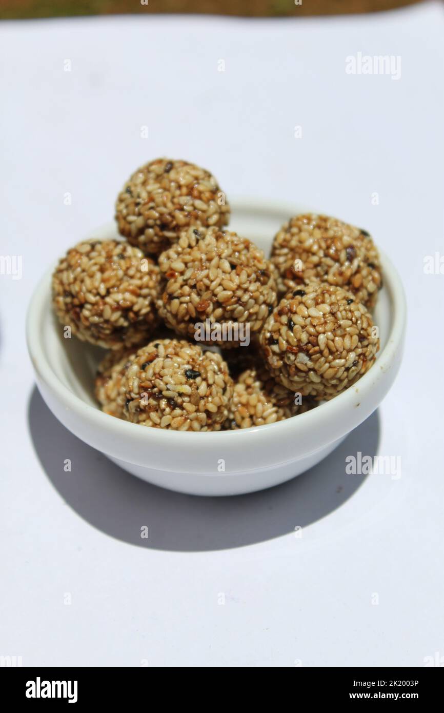 A dish of delicious sesame balls made using sesame seeds and honey.  In Asian countries such as Sri Lanka, sesame-based dishes are common. Stock Photo