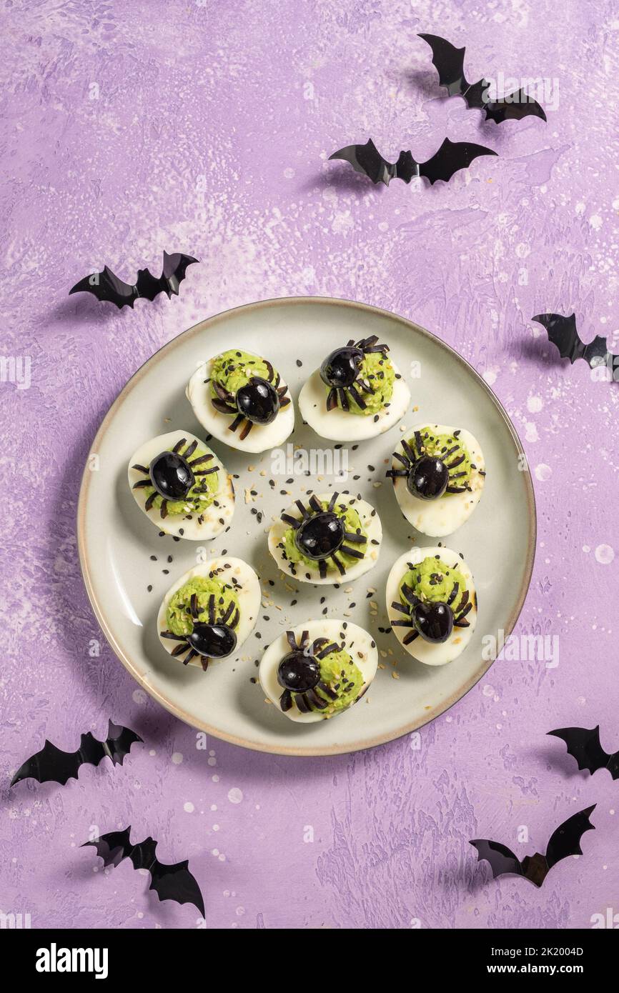 Deviled eggs with a Spider for Halloween Stock Photo