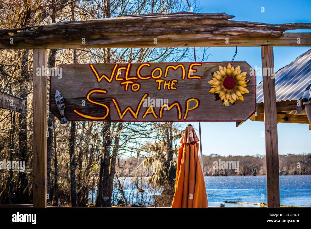 An entrance road going to marshland area in Abbeville, Louisiana Stock