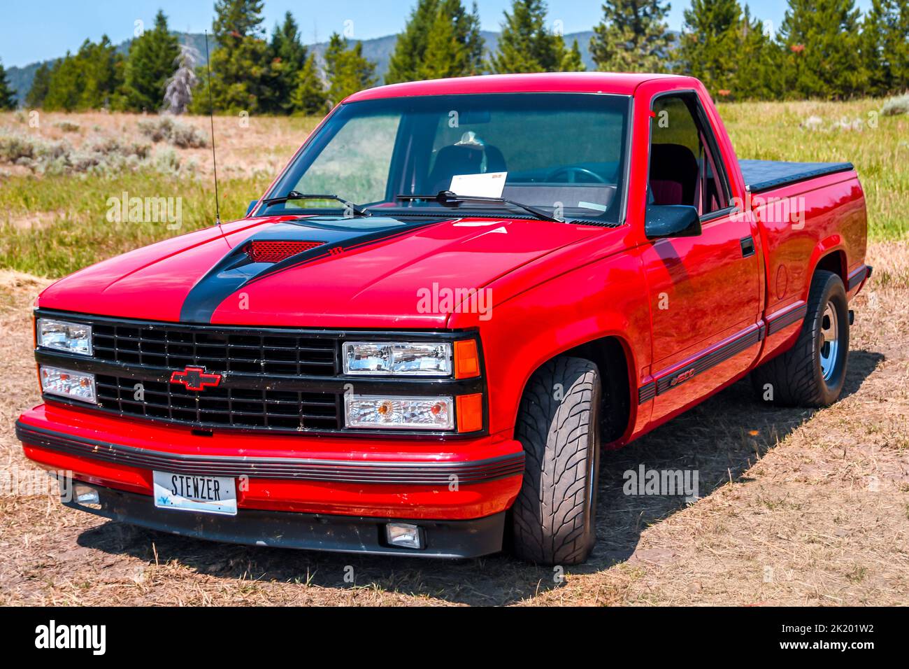 A large outdoor Rev Mountain Car and Bike Show in Lincoln, Montana
