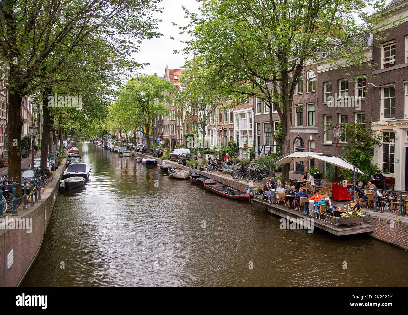 A cafe along a canal in Amsterdam Stock Photo