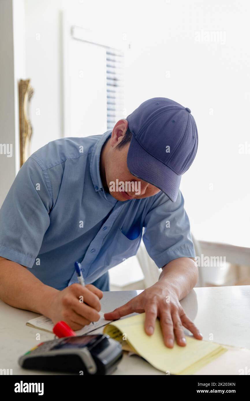 Man Filing Material Form filling man hi-res stock photography and images - Alamy