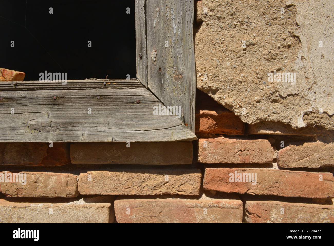 The window frame of a dilapidated house Stock Photo