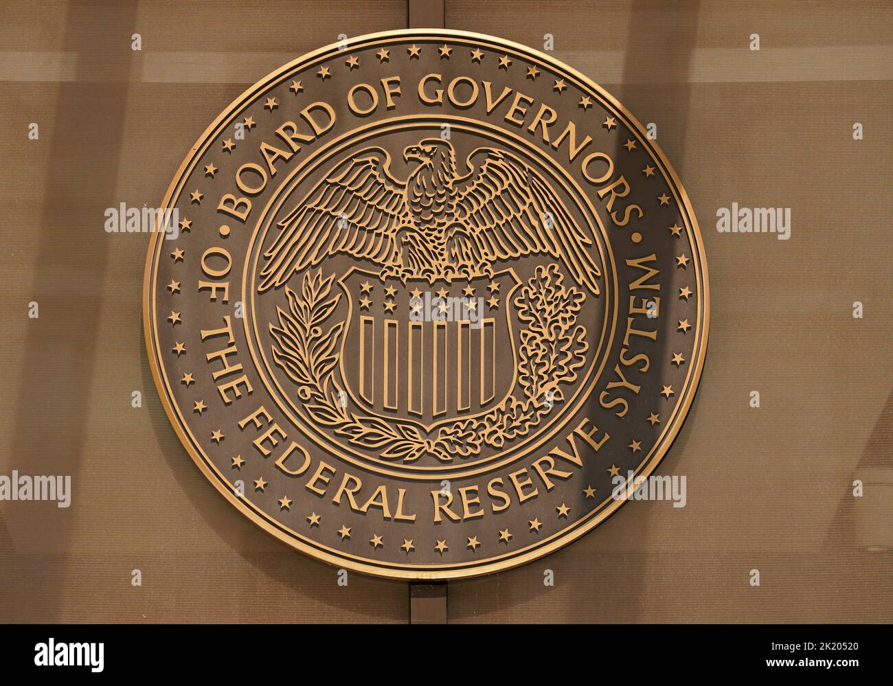 A sign for the Federal Reserve Board of Governors is seen at the entrance to the William McChesney Martin Jr. building ahead of a news conference by Federal Reserve Board Chairman Jerome Powell on interest rate policy, in Washington, U.S., September 21, 2022. REUTERS/Kevin Lamarque Stock Photo