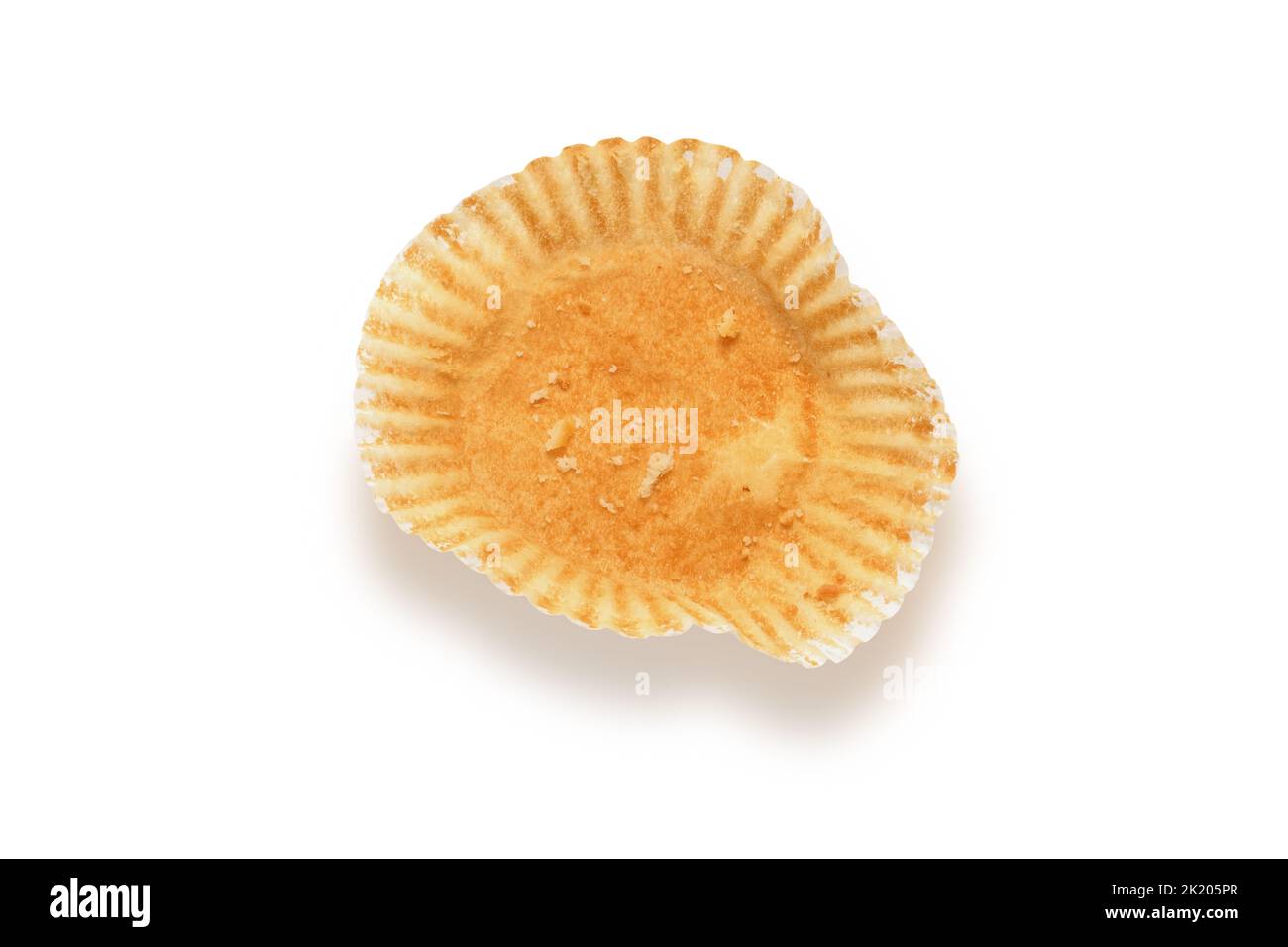 Empty cupcake bun wrapper isolated on white with clipping path, shot from above cut out Stock Photo