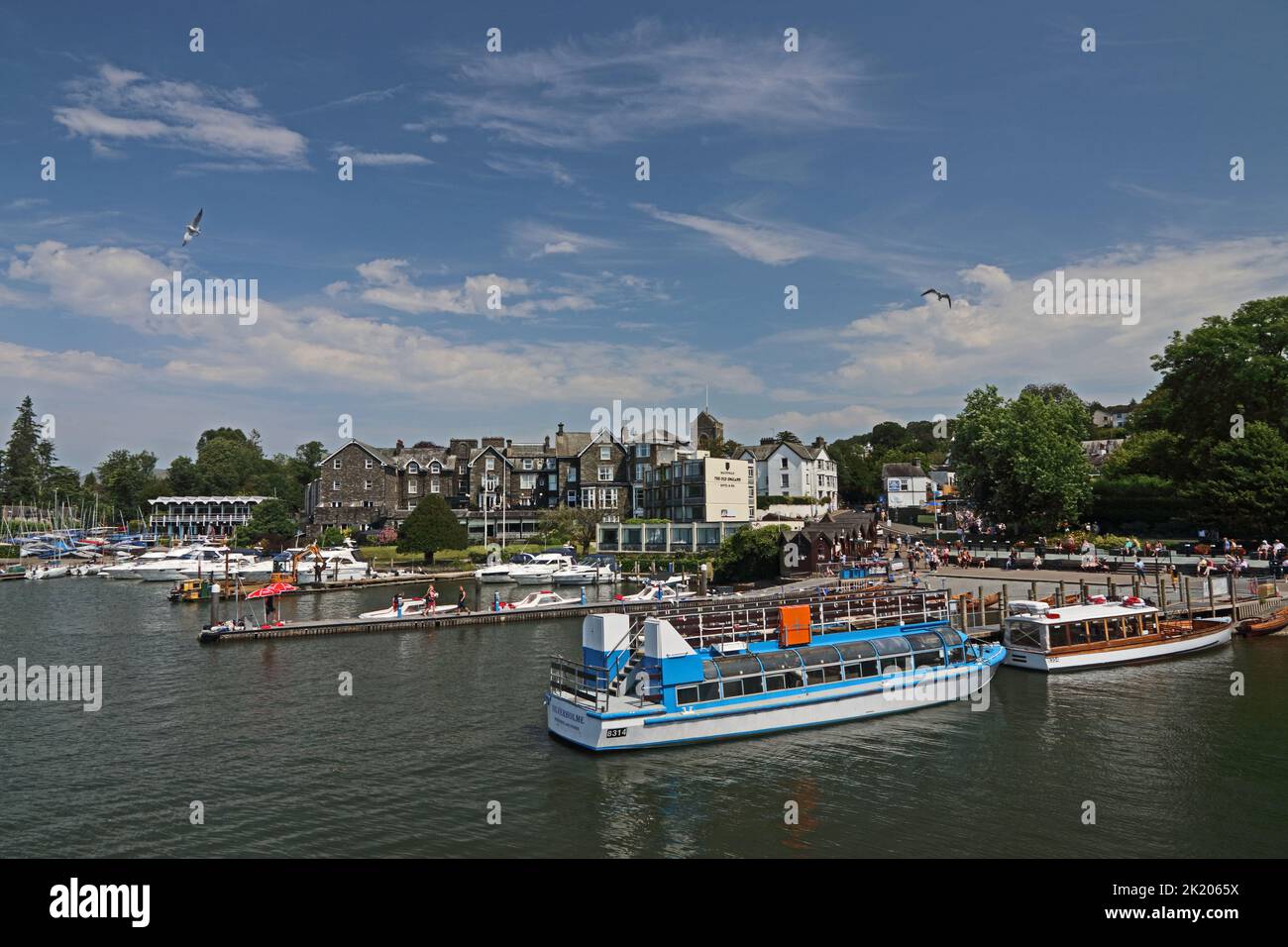 Bowness Piers and tourist boats, Windermere Stock Photo