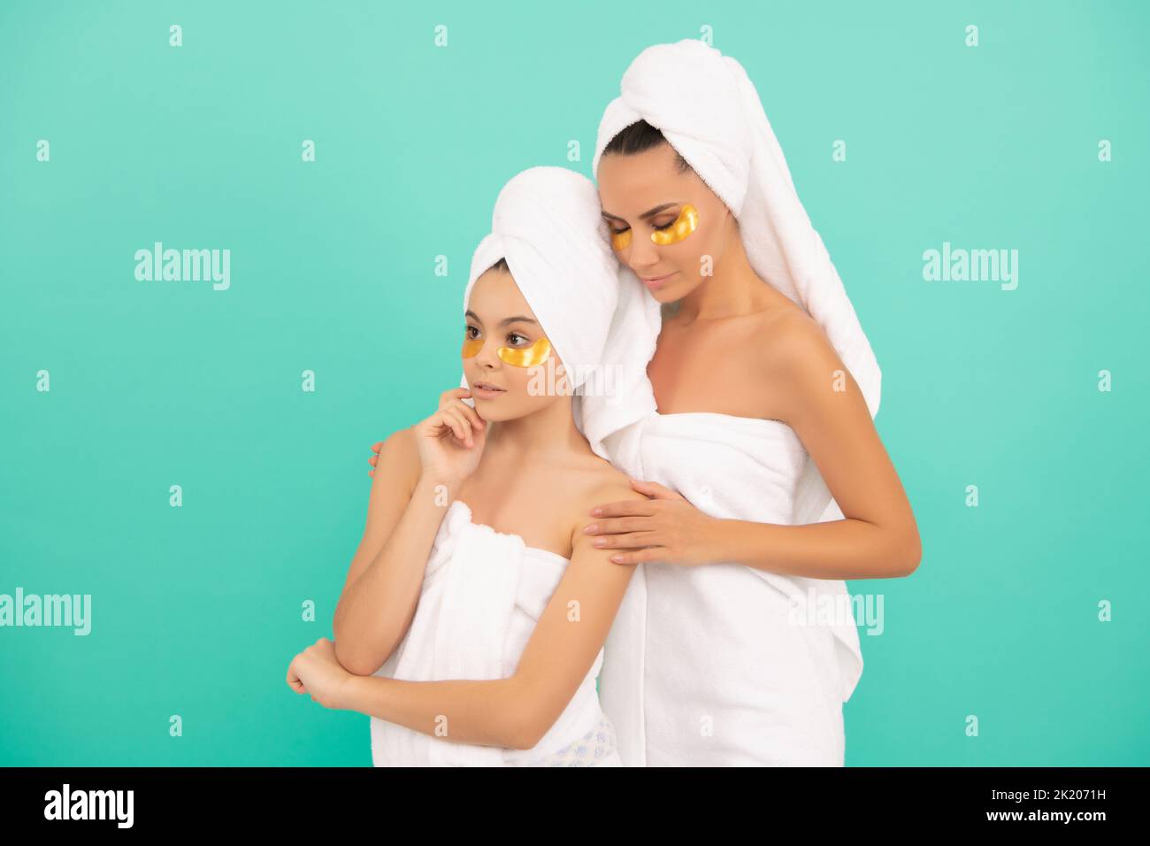 family spa of mother and daughter with collagen patch Stock Photo