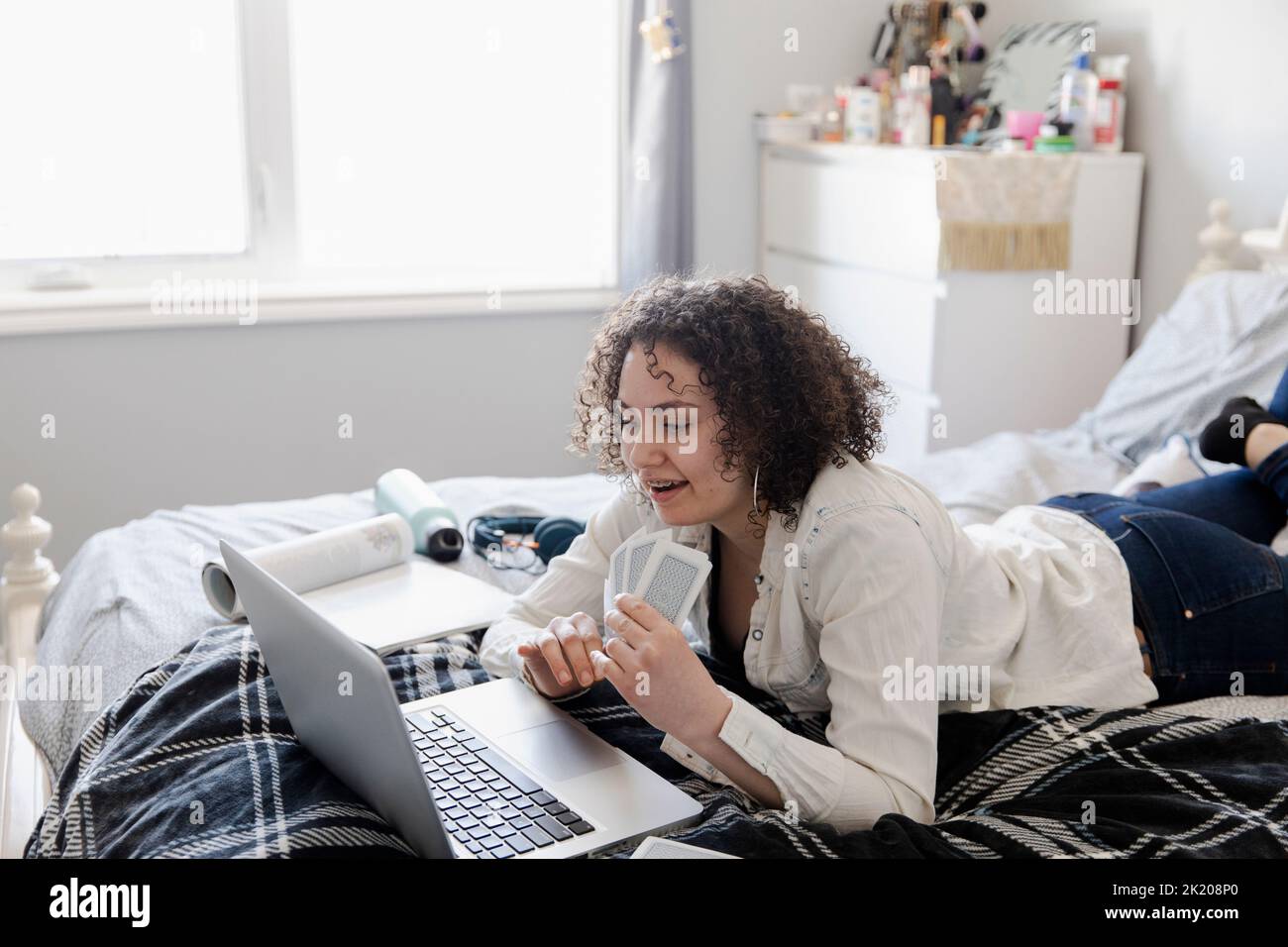 Girl lying on bed hi-res stock photography and images - Alamy
