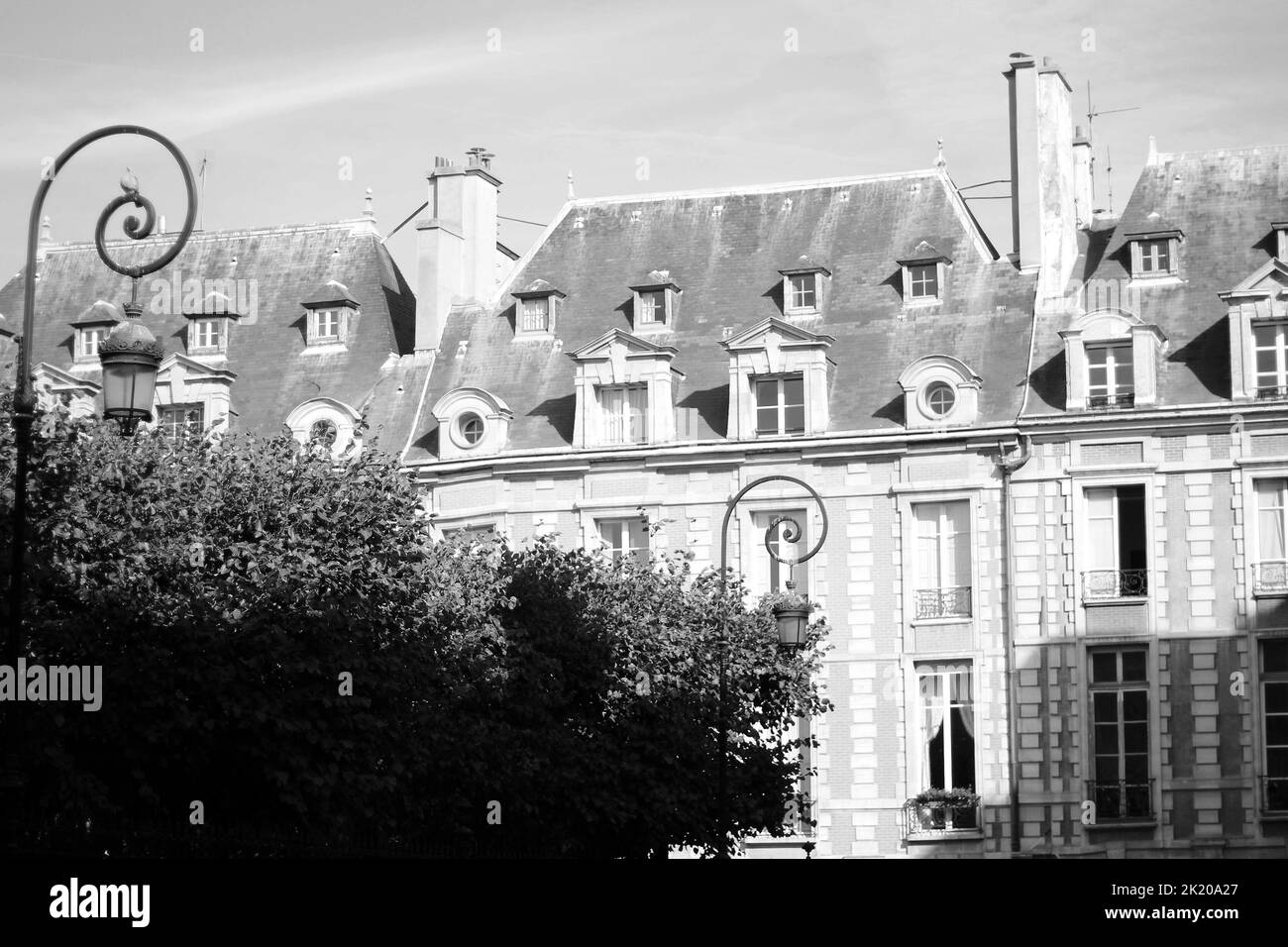 Paris, France. The Place des Vosges (Place Royale) Building Facade. Parisian Landmarks Architecture. Stock Photo