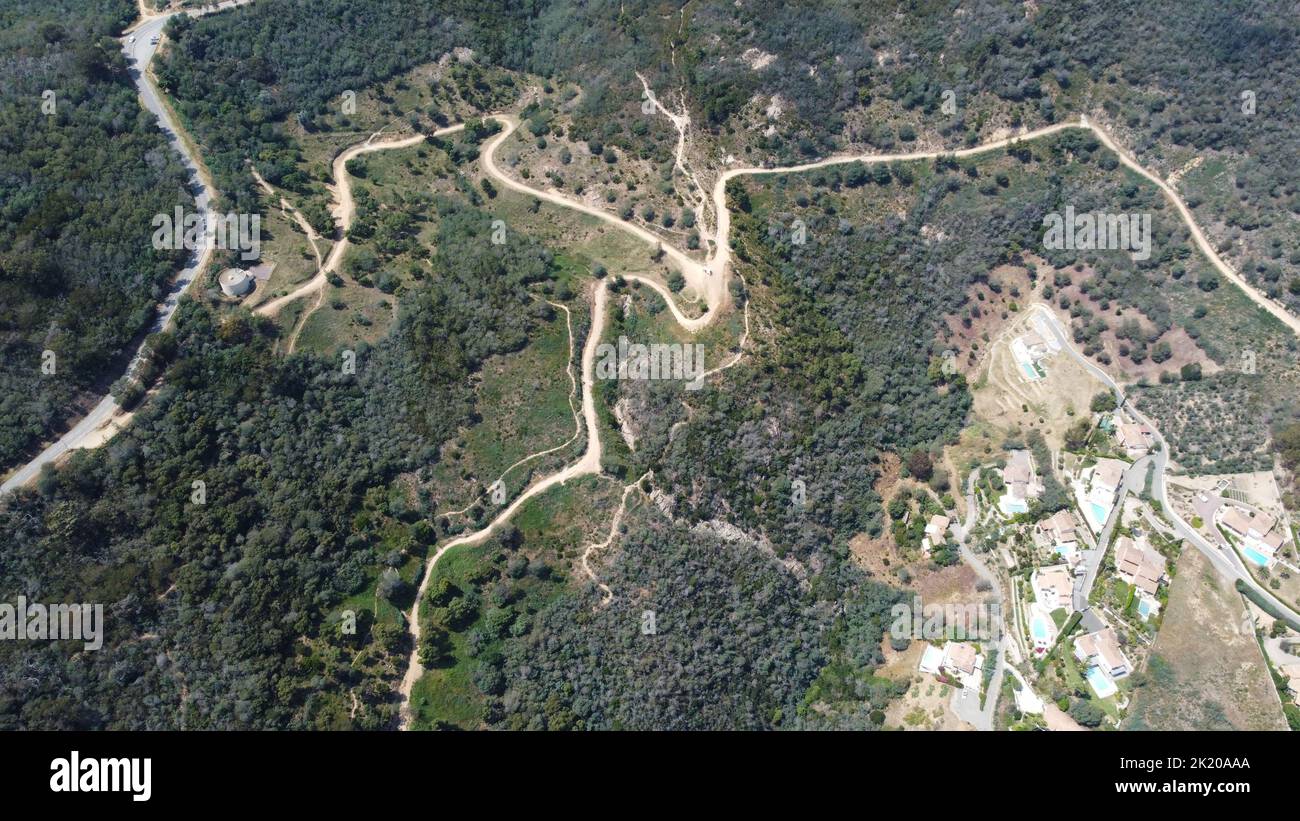 A drone photo of a walking trail from above Stock Photo