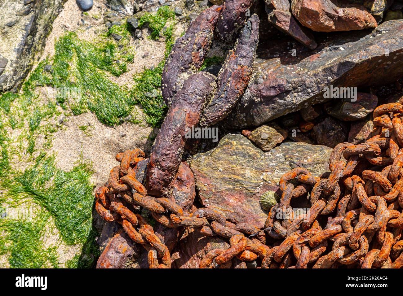 Rusty Chanis Rusty chains rocks on hi-res stock photography and images - Alamy