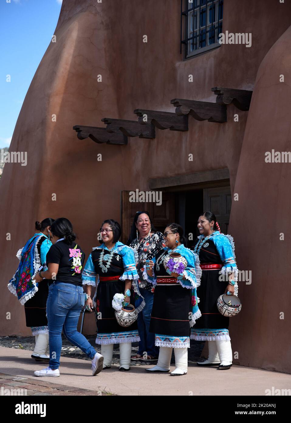 Native American members of the Zuni Olla Maidens from the Zuni Pueblo near Gallup, New Mexico, prepare to perform in Santa Fe, New Mexico. Stock Photo