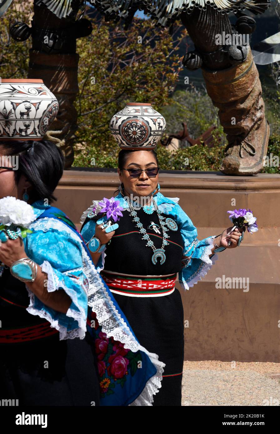 Native American members of the Zuni Olla Maidens from the Zuni Pueblo near Gallup, New Mexico, perform in a public event in Santa Fe, New Mexico. Stock Photo