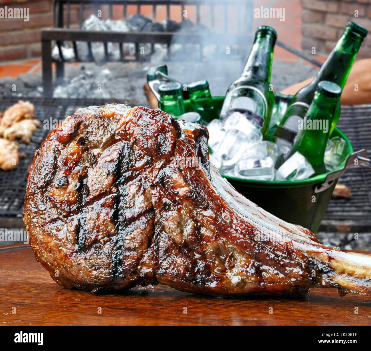 freshly grilled Tomahawk steaks beer Stock Photo Alamy