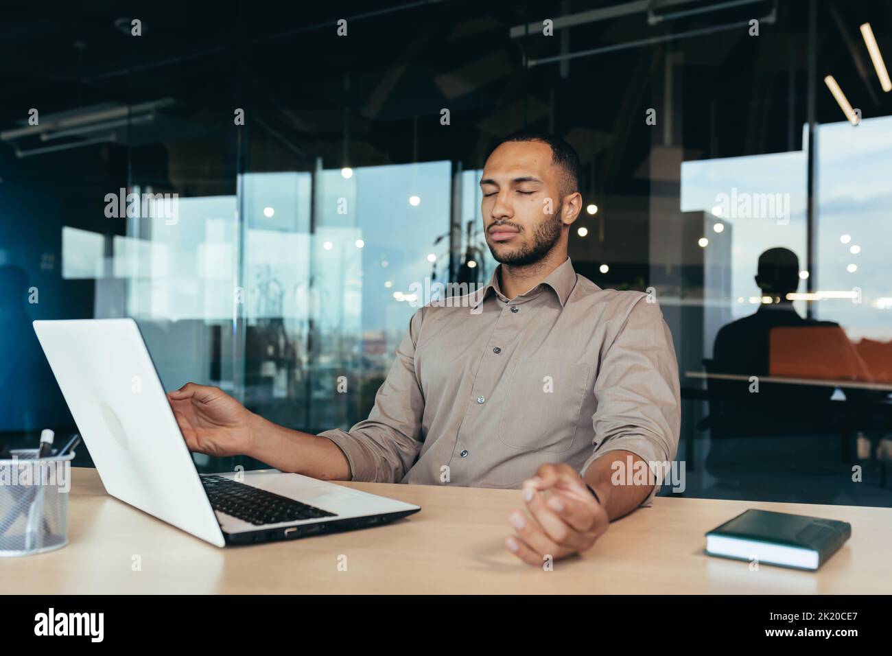 Successful businessman working inside modern office building, man