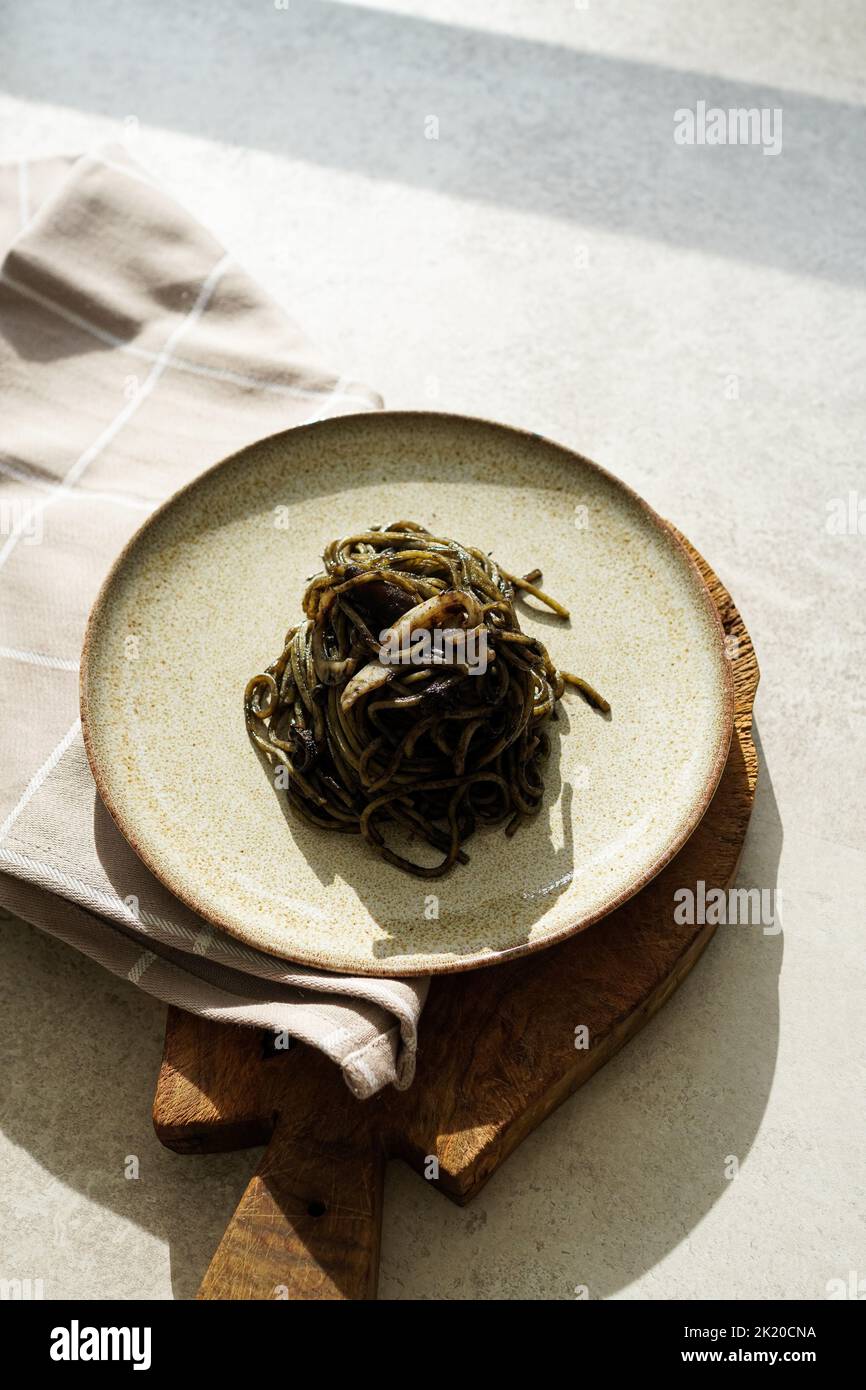 Spaghetti with squid ink (spaghetti al nero di seppia Stock Photo - Alamy