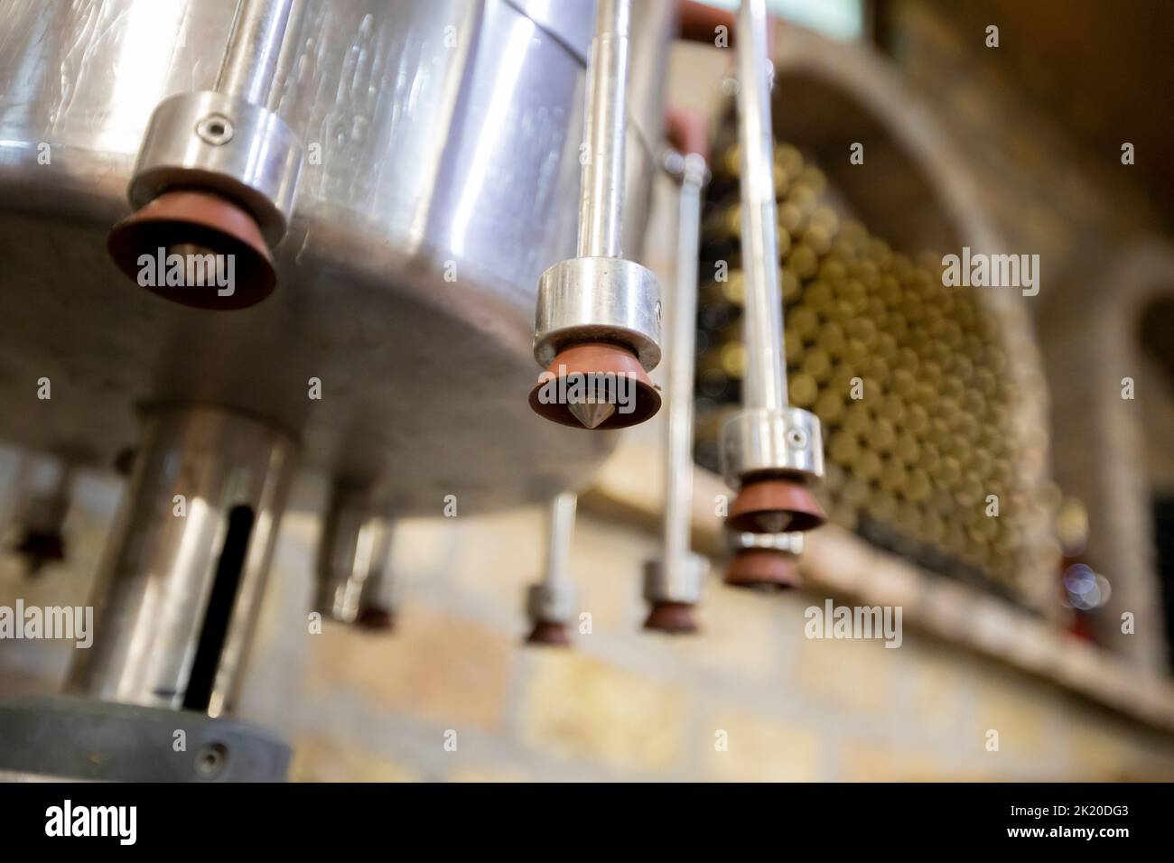 Wine bottle filling machine in the winecellar Stock Photo