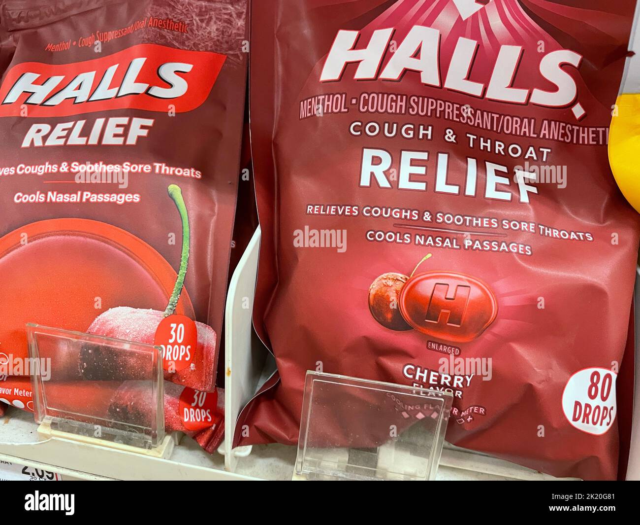 Grovetown, Ga USA - 09 21 22: Grocery store medicine section Halls cough drops cherry Stock Photo