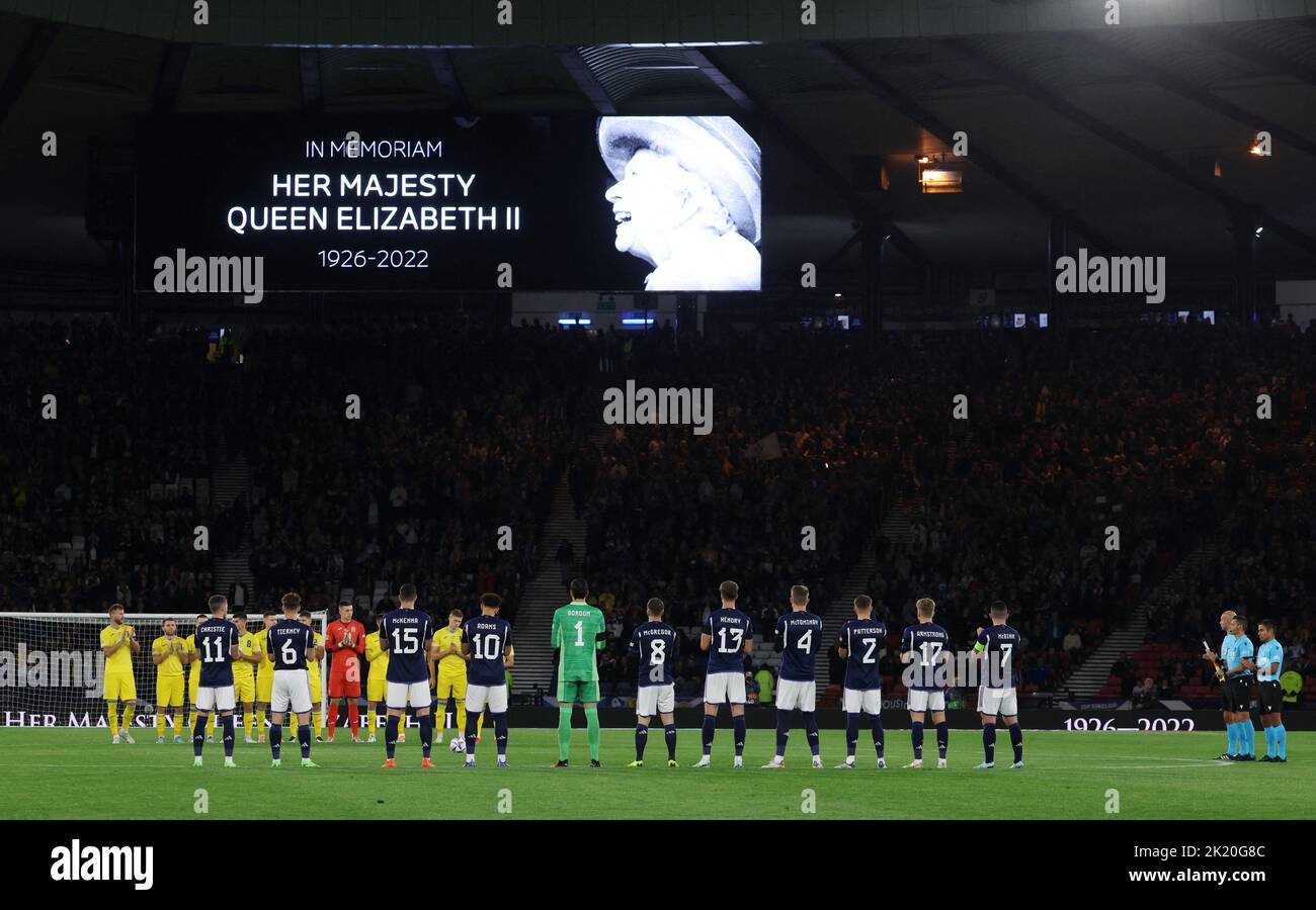 Soccer Football - UEFA Nations League - Group E - Scotland v Ukraine - Hampden Park, Glasgow, Scotland, Britain - September 21, 2022 General view of the teams and officials before the match following the death of Britain's Queen Elizabeth REUTERS/Russell Cheyne Stock Photo