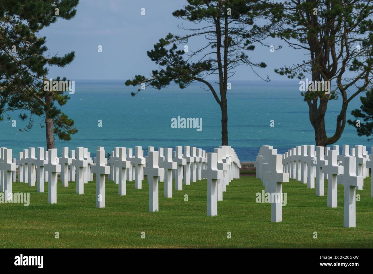 Rows of white crosses of fallen american soldiers at American War Cemetery at Omaha Beach Cimetiere Americain, Colleville-sur-Mer, Normandy, France Stock Photo