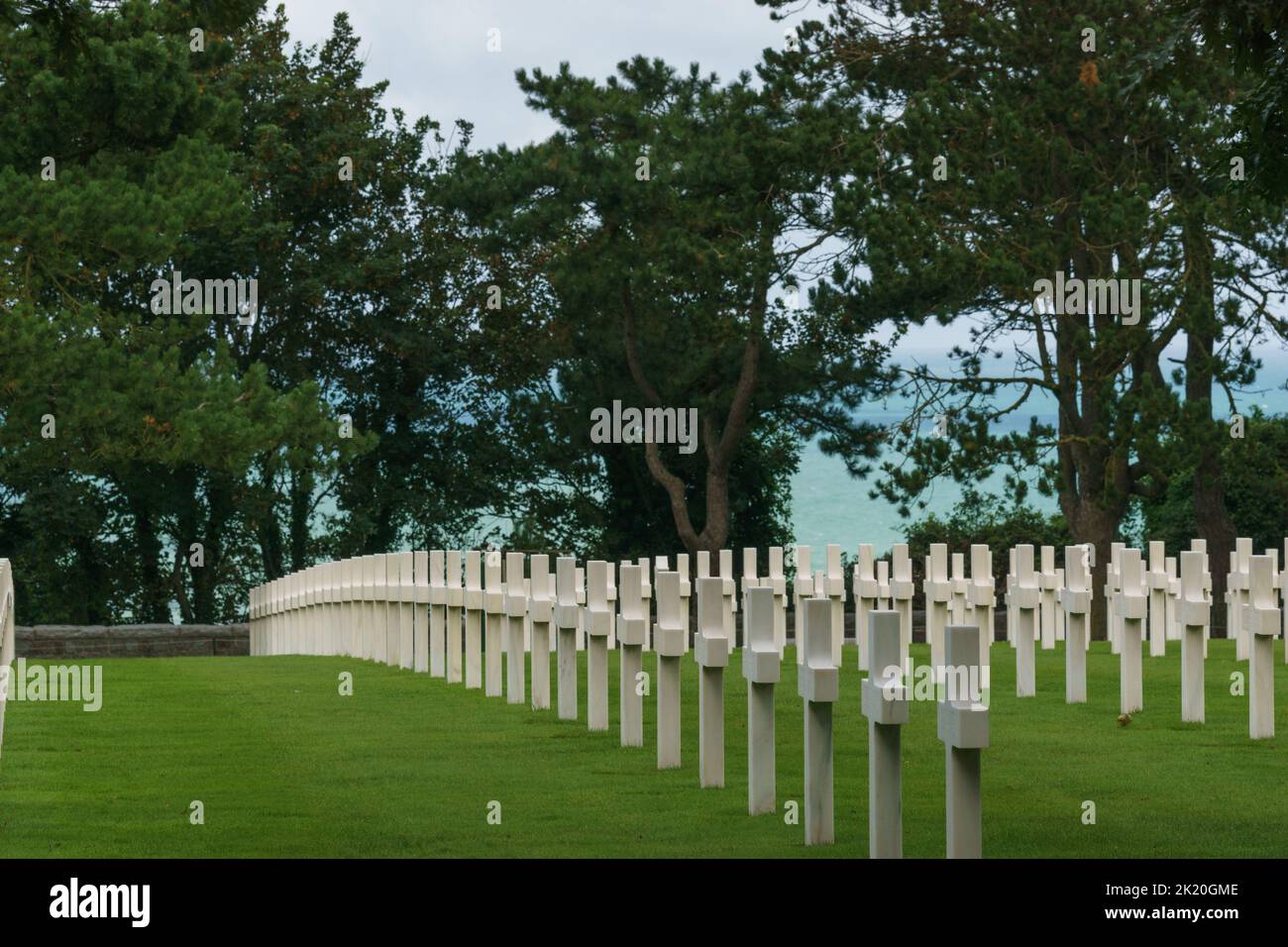 Rows of white crosses of fallen american soldiers at American War Cemetery at Omaha Beach Cimetiere Americain, Colleville-sur-Mer, Normandy, France Stock Photo
