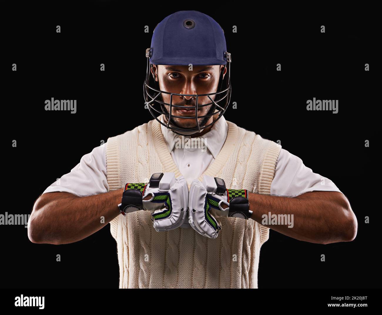 The opening batsman. A cropped shot of an ethnic young man in cricket