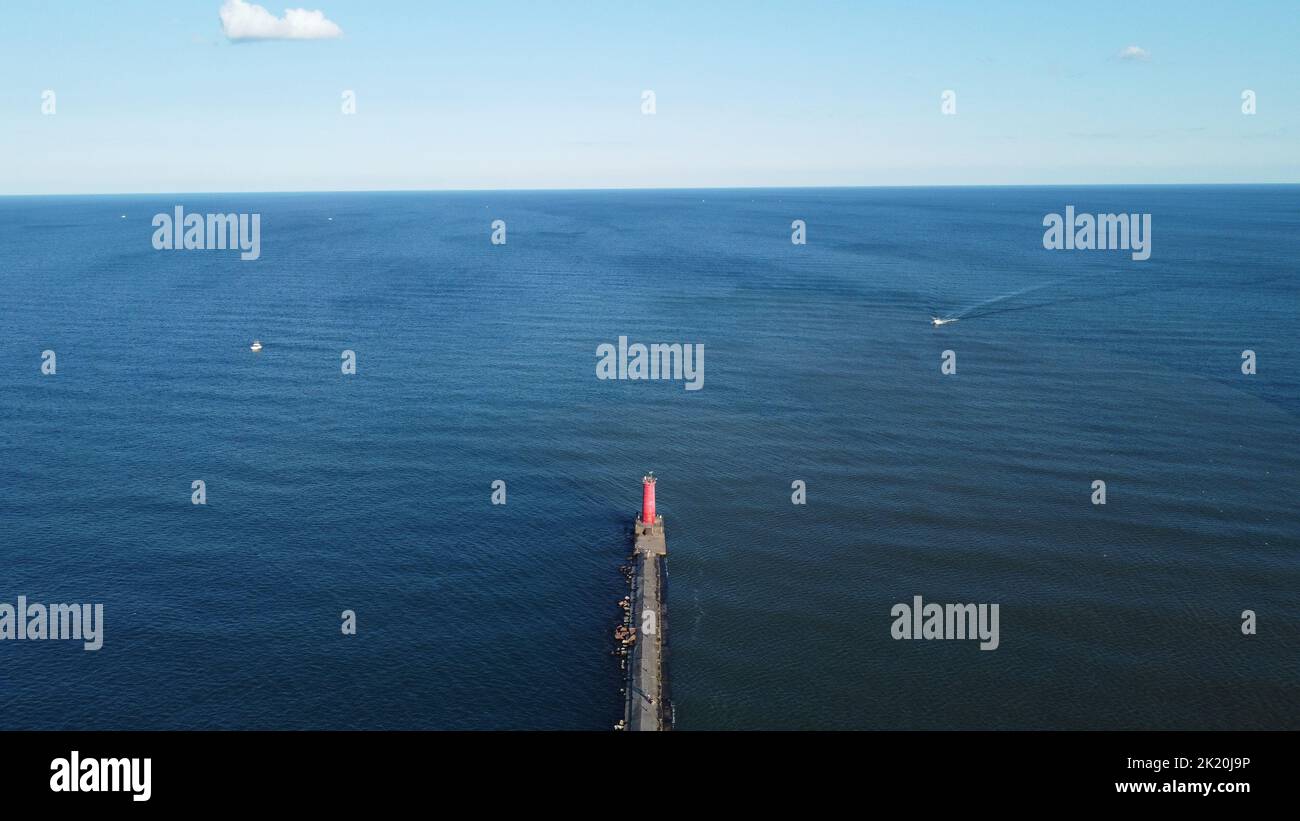 An aerial view of the sea with a pier under the clear sky Stock Photo ...