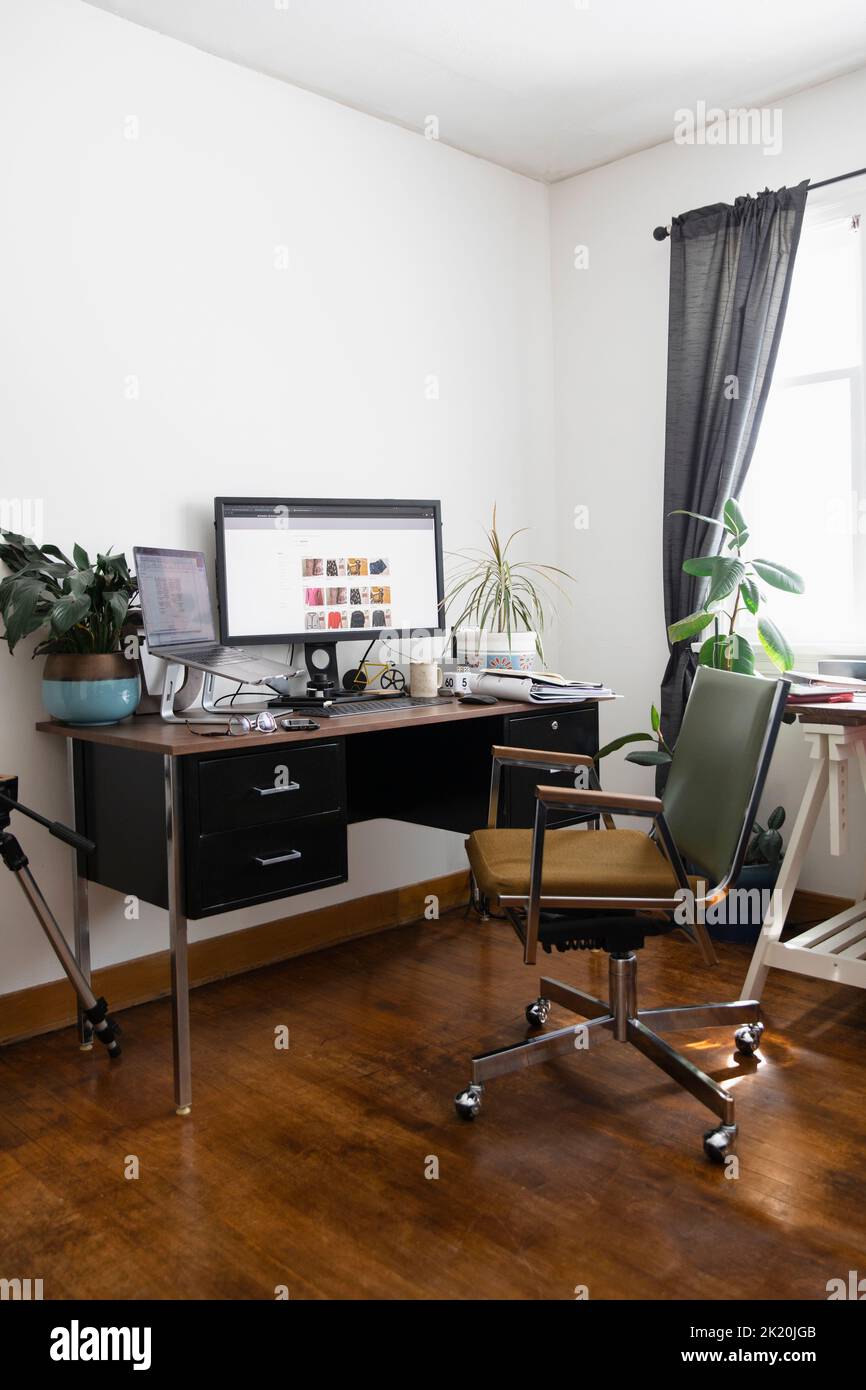 Computer on desk in home office Stock Photo Alamy