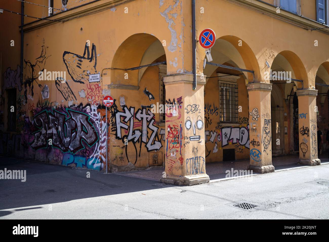 Graffiti covered buildings in the university district in Bologna Italy Stock Photo