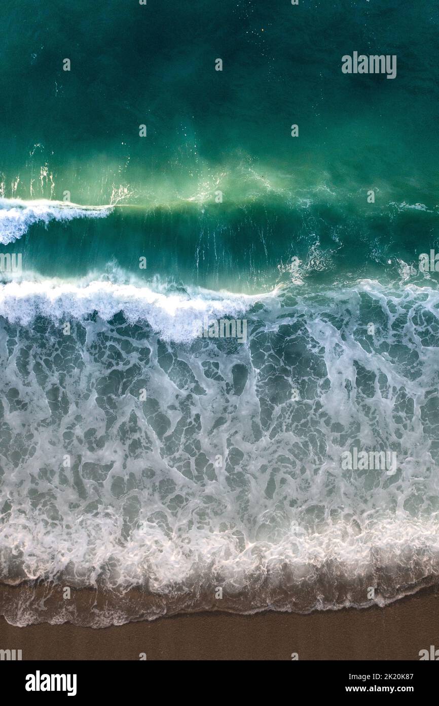 Birds Eye View of the waves crashing into the beach in Costa Rica Stock ...