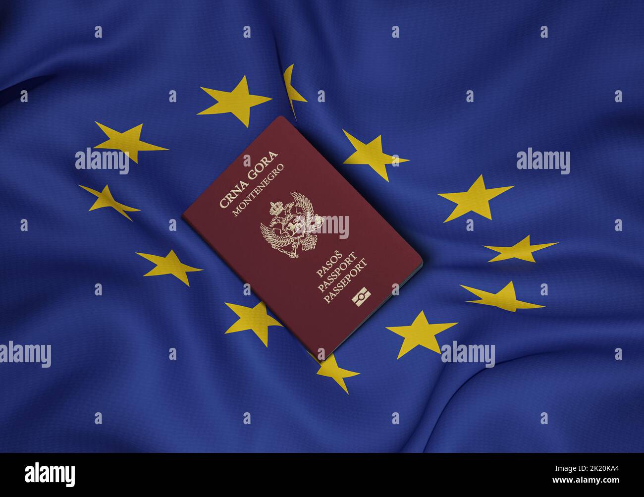 Montenegro passport with European Union flag in background ,The Montenegrin passport is the primary document of international travel issued by Montene Stock Photo