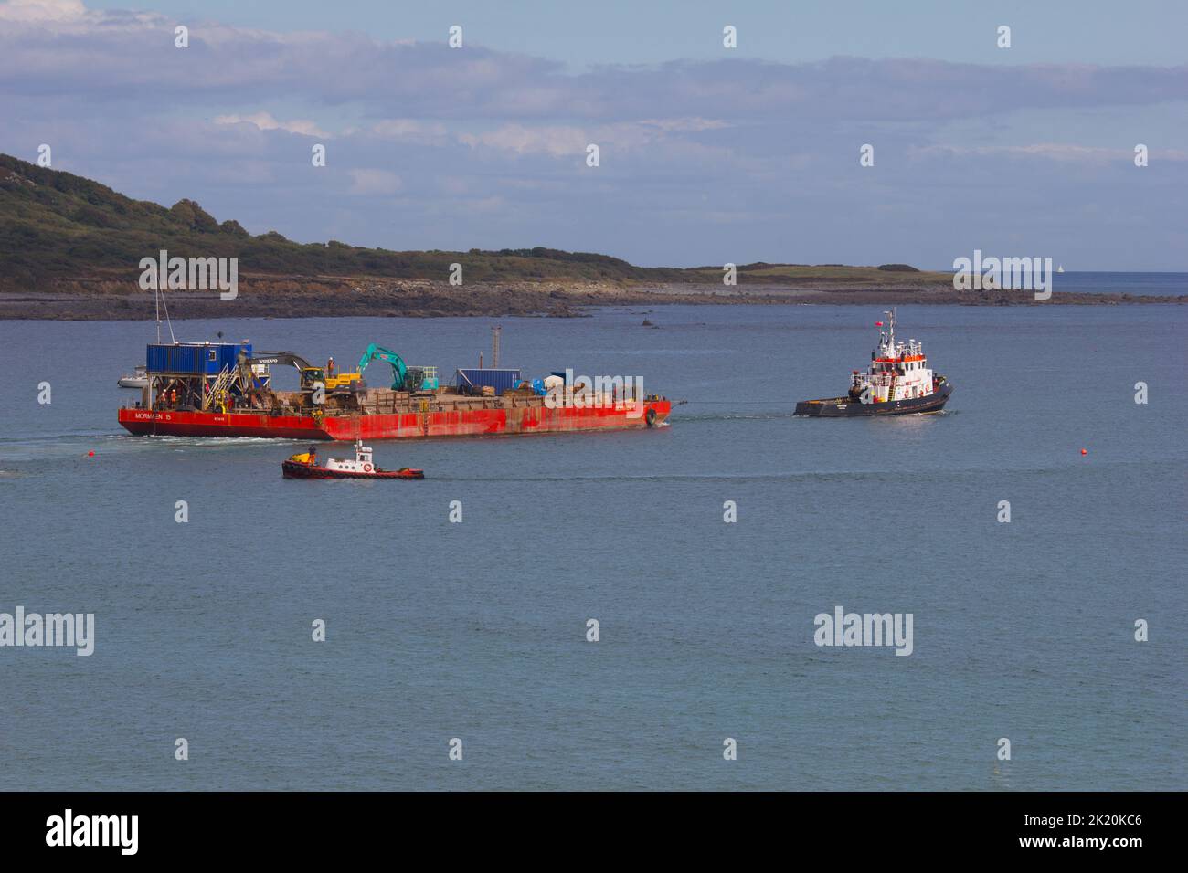 Transport barge after offloading armour rocks for breakwater ...