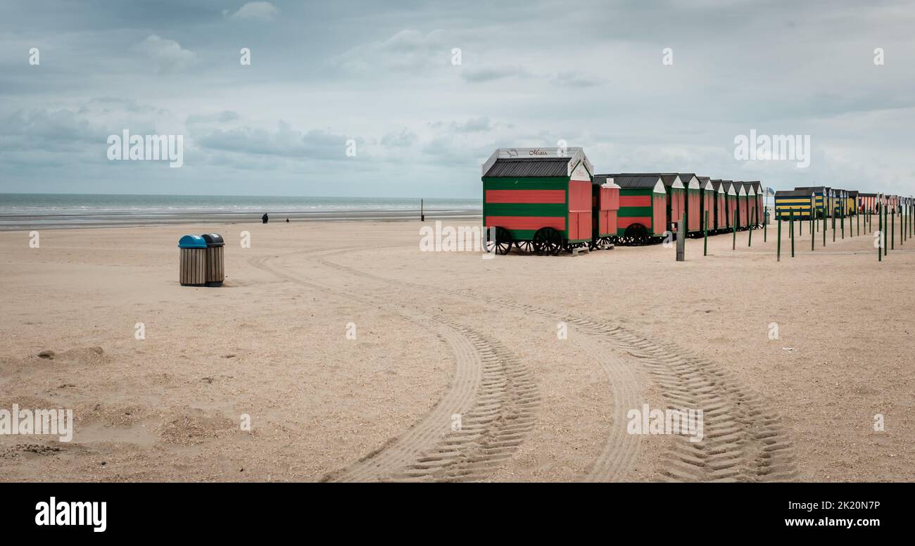 Row of colorful beach huts on a cloudy day, Sunday 23 July 2017, De Panne, Belgium. Stock Photo